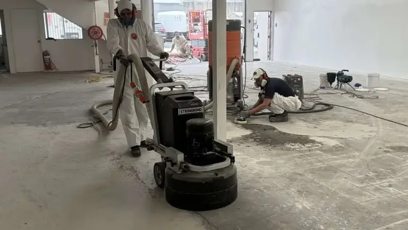 Concrete grinding preparation before epoxy coating