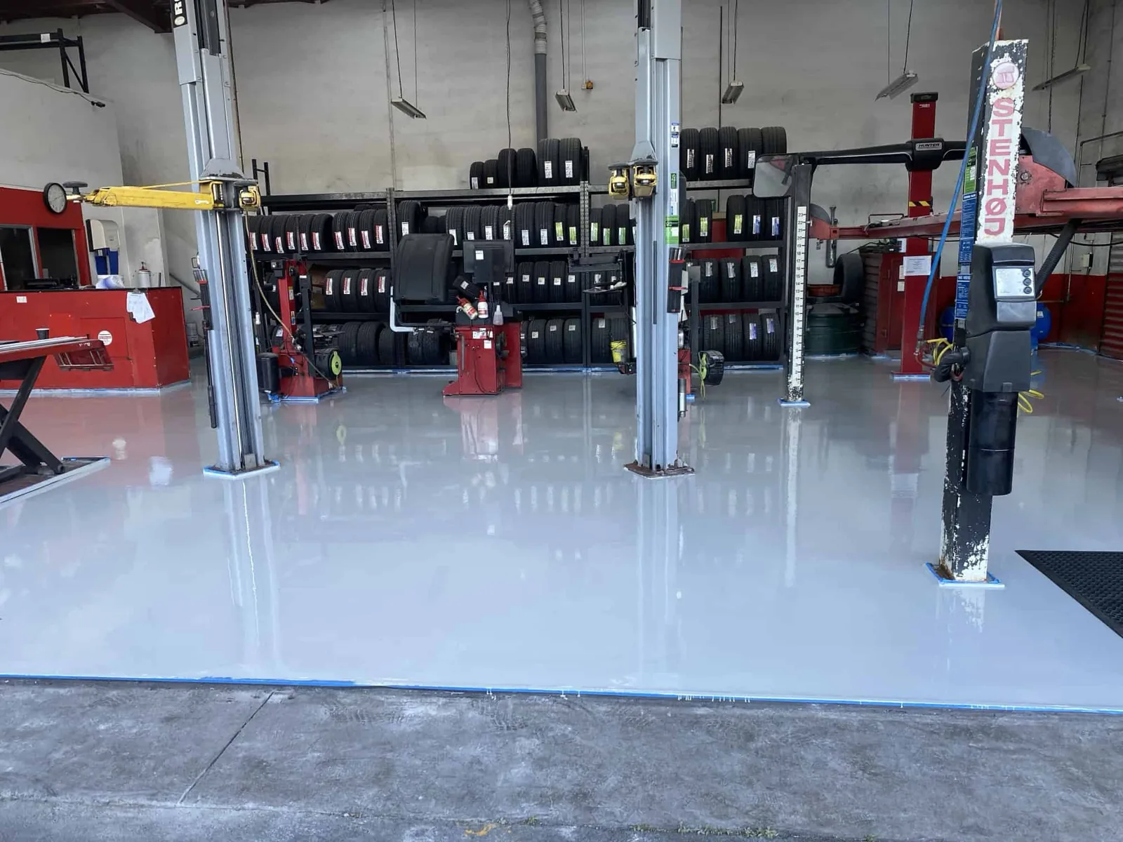 Clear-coated grind-and-seal floor