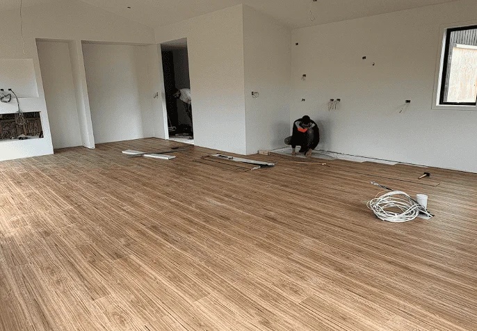 Finished wood-look SPC flooring in a modern Auckland interior